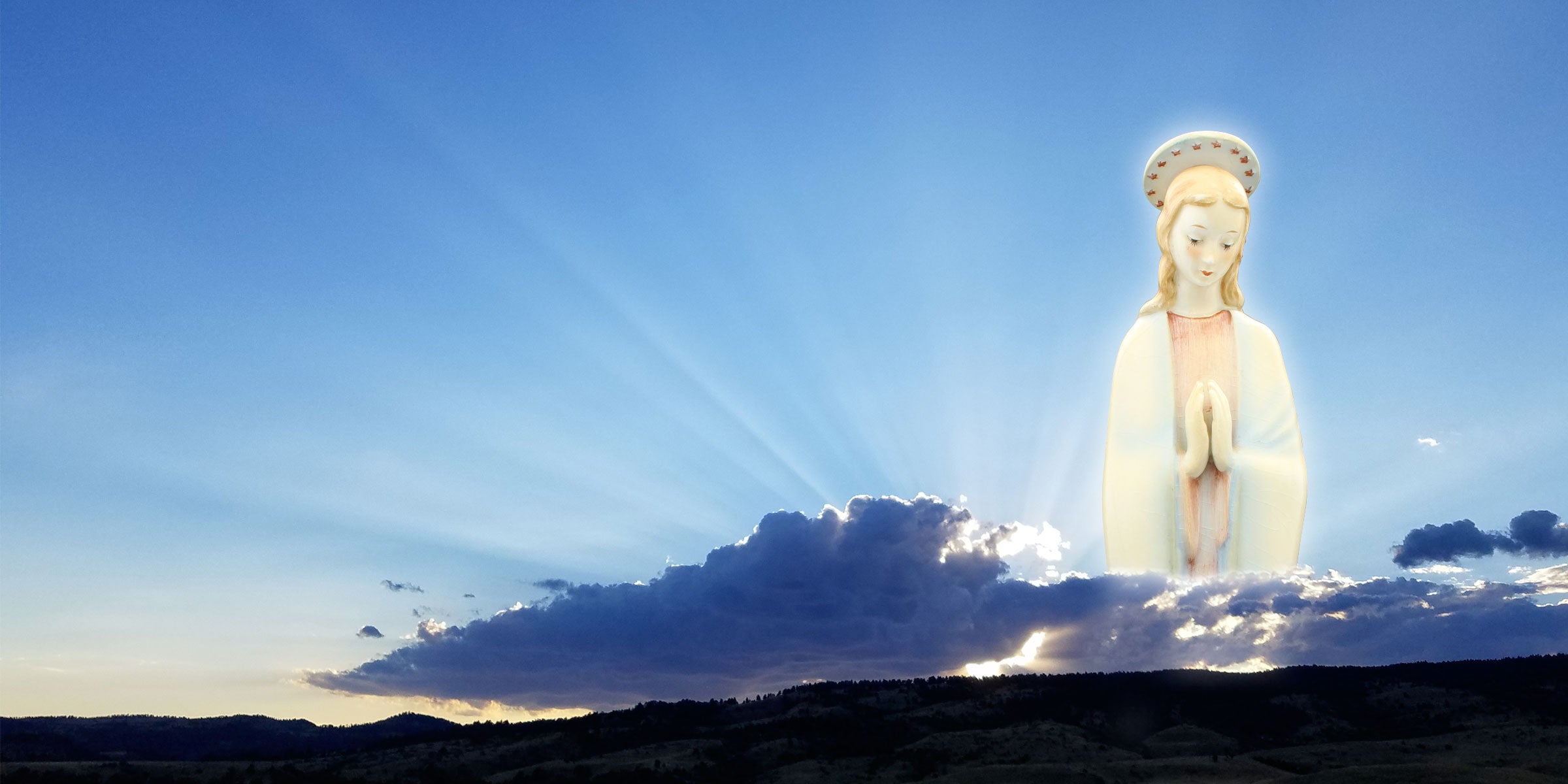InHeartland Spiritual Material, Our Lady in Prayer, Sunset over the hills, Our Lady above the clouds looking over the land at sunset