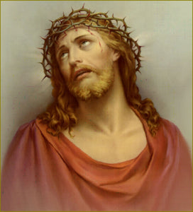sorrowful look of Jesus crowned with thorns looking up
