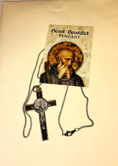 Saint Benedict pendant with chain on a beige background and picture of St. Benedict 