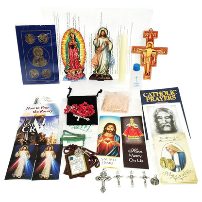 Picture of items in the Vital 3 Days of Darkness Kit. Click on the "Kit Items" Tab to see a list of all the items in this kit. This picture shows  Our Lady of Guadalupe and Divine Mercy with paperback RSV New Testament with Psalms.